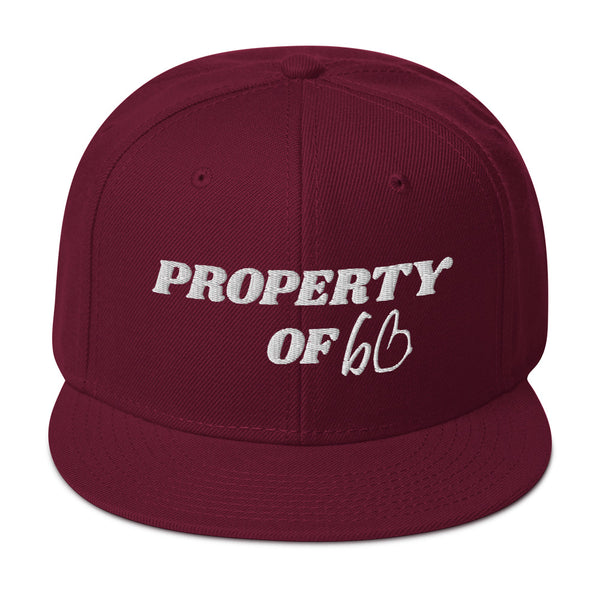 PROPERTY OF bb Snapback Hat